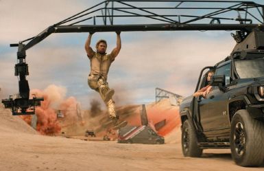 Stunt camera rig in action over a desert chase
